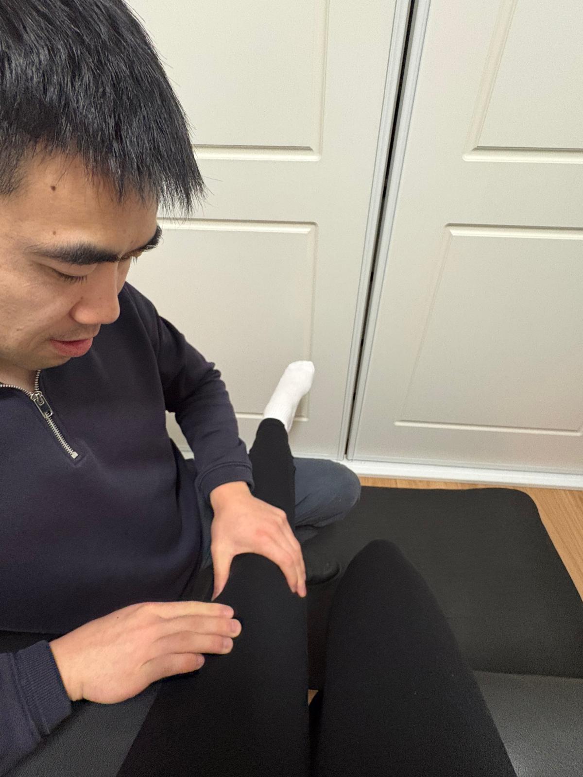 Philip Chau assessing leg and lower limb mechanics